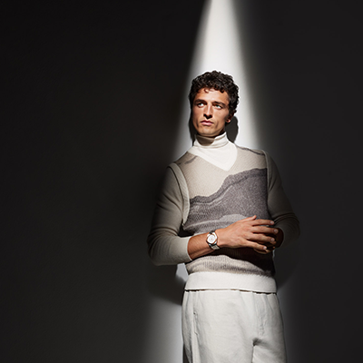 people shot, man with watch, dark background with light spot on man, wempe campaign, oct 2023, art direction by jutta schmid/bueroschmid